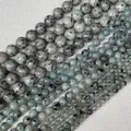 Perle in pietra naturale di fiori d'erba grigie e blu con macchie nere per gioielli fai da te - Blu Tianshan 6mm