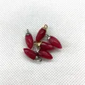 Faceted red stone bullet shape charms with gold and silver metal bails for DIY jewelry - Design No.9