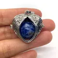 Silver angel wing heart locket pendant with blue natural stone ball inlay - Blue Spot Stone
