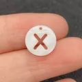 Perle en coquillage naturel 12mm ronde avec lettre X ajourée pour bijoux artisanaux - Lettre X