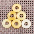 Set mit sechs gelben Naturstein-Anhängern in polierter runder Donut-Form - 20mm / Topas