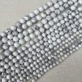 Perle in howlite bianca lucida per gioielli fai-da-te con venature marmoree naturali - Howlite