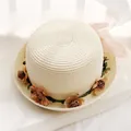 Straw sun hat in cream white featuring floral band and pink chiffon ribbon detail - Milky White