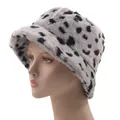 Winter faux fur bucket hat with cow print pattern for warmth and fashion style - M (56-58cm) / Black and White Cow Print