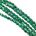 Nahaufnahme von facettierten ovalen Malachitperlen mit grünen Streifen für DIY-Schmuck - 6x8x4mm (Ca. 25 Stück) / Malachit