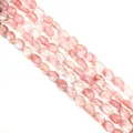 Vue détaillée de perles ovales facettées en pierre rose avec textures craquelées naturelles - 6x8x4mm (Env. 25 Pcs) / Quartz Pastèque