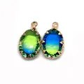 Ciondolo in cristallo ovale sfaccettato con sfumatura blu-verde e base dorata - Taglia 13 / 11x19 Mm 12 G/pezzo (50 Pezzi/confezione)