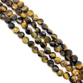 Macro shot of faceted tiger eye gemstone beads in flat round shape for DIY jewelry - 8x8x5mm (Approx 25 Pieces) / Tiger's Eye