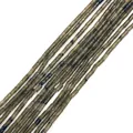 Close-up of cylindrical labradorite stone beads with blue flash for DIY jewelry making - 2x4mm / Labradorite