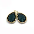Macro detail of teardrop-shaped faceted gemstone pendants with beaded gold metal edges - Number 2 / 12x18mm 1.2g/piece (50 Pieces/pack)