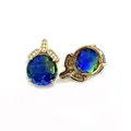 Detail of blue-green faceted gemstone pendant with 4-claw gold setting and zircon accents - Size 7 / 9x13x19mm 3g/piece (20 Pieces/pack)