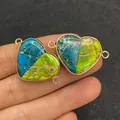 Detailed macro view of heart-shaped natural stone connectors held to show size - Peacock Blue Light Green Spliced Heart Style (24)