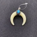 Close-up of crescent bone pendant with turquoise bead and sparkling rhinestones - Cream White Blue Stone Moon Style (No. 3 34mm5g)