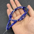 Deep blue square natural stone loose beads held in hand for size comparison - 3x6mm / Dark Blue White Veined