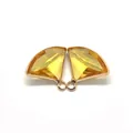 Macro detail of fan-shaped yellow crystal pendants with golden scalloped edges for DIY jewelry - Size 14 / 17x19mm 1.3g/piece (50 Pieces/pack)