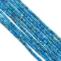 Flat lay of polished blue turquoise imperial stone disc beads for DIY jewelry making - Lake Blue