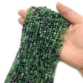 Faceted natural ruby zoisite beads strands held by hand for DIY jewelry making - Ruby in Zoisite Type 1
