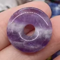Natural purple amethyst gemstone donut pendant with white crystal textures and polished finish - Purple Crystal