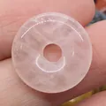 Polished natural rose quartz donut pendant with internal textures and icy pink finish - Rose Quartz