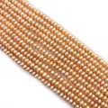 Strands of champagne orange AA-grade freshwater pearls in flat round shape for DIY jewelry - 3-4mm / Pink