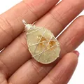 Handcrafted teardrop citrine crystal pendant wrapped in silver wire on hand palm - 19x35mm / Teardrop Shape (No. 3)