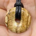 Natural Picture Jasper donut pendant with unique brown marbling on black cord - Picture Jasper
