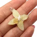 Cross-star pendant in light yellow natural stone with silver wire-wrapped detailing - 33x37mm