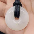 White quartz donut pendant necklace with natural texture and black braided rope - White Jade