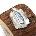 Handcrafted blue baroque pearl and clear quartz pendant wrapped in silver wire on wood - No.3 Iridescent Dark Pearl Style