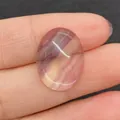 Ovale paarse en gele gestreepte fluoriet edelsteen die de doorschijnendheid toont - 15x20mm / Fluoriet