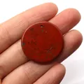 Polished round red jasper stone pendant with natural dark patterns and pre-drilled hole - Red Jasper
