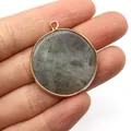 Handheld round labradorite pendant with a golden rim and small hanging loop for DIY jewelry - Flash Stone (Labradorite)