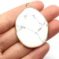 Teardrop white turquoise pendant with gold plated rim and natural grey veins - Single Pendant (No Chain) / Howlite