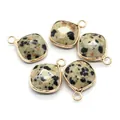 Five square Dalmatian Jasper pendants with gold metal edges on a white background - Ribbon Edged / Dalmatian Jasper