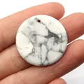 Handheld white howlite stone round pendant with natural grey marble veining pattern - Howlite