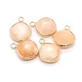 Five rose quartz faceted stones with gold metal borders in a square cushion shape - Ribbon Edged / Pink Aventurine