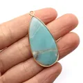 Water drop natural stone pendant in light blue with gold plated edge and top metal bail - Amazonite