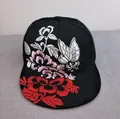 Black flat brim baseball cap featuring detailed floral peony and butterfly embroidery - Flower Butterfly Embroidery (Black)