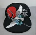 Black snapback hat featuring detailed crane embroidery and red sun oriental design - Crane and Sun Embroidery (Black)