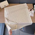 Sciarpa effetto cashmere beige e bianca con motivo a griglia e frange decorative - Cachi