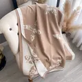 Thick cashmere-like scarf with camel butterfly and flower print featuring tassel edges - Khaki
