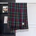 Detail of checkered cashmere-feel scarf with fringes and Good Luck woven label - Black Green (GZ-230)