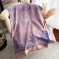 Lilac and pink zebra pattern knitted scarf with soft tassels on velvet chair - Purple