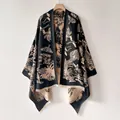 Detailed close-up of retro black shawl with beige butterfly embroidery and elegant fringe - Forest Black