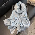 Light blue floral silk scarf with elegant tassels and shimmering silver thread details - Tsm-080 Blue