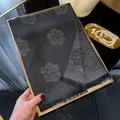 Elegant black shawl with silver camellia floral print and shimmering lurex fibers - Tsm-450 Black