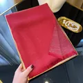 Red tencel cotton scarf with metallic glitter finish and elegant fringe details - Red