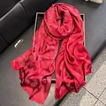 Deep red silk scarf with shimmering metallic threads and soft tassel edge detailing - Red