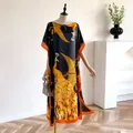 Ethnic kaftan dress in black and orange with golden peacock print and batwing sleeves - Black Yellow