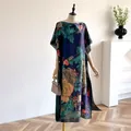 Deep blue silk-like maxi dress with large peony floral print and batwing sleeves - Green